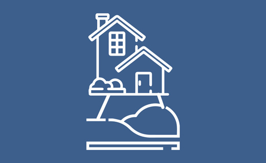 White line drawing of a house with a garden and bushes on a solid blue background.