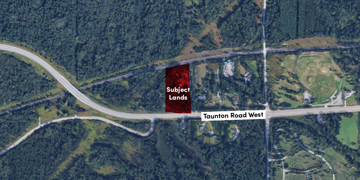 Aerial view showing a highlighted area labelled "Subject Lands" north of Taunton Road West, surrounded by trees and roads.