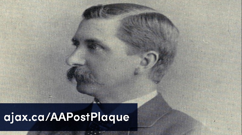 Black-and-white profile portrait of a man with a moustache, wearing a suit. Text overlay reads: "ajax.ca/AAPostPlaque".