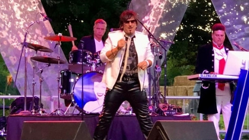 The band Blue Silver performs on stage.